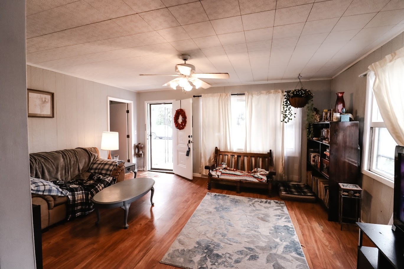 35 Monroe Avenue Charleston, IL 61920 - Photo 7 of 23 a living room with furniture and wooden floor