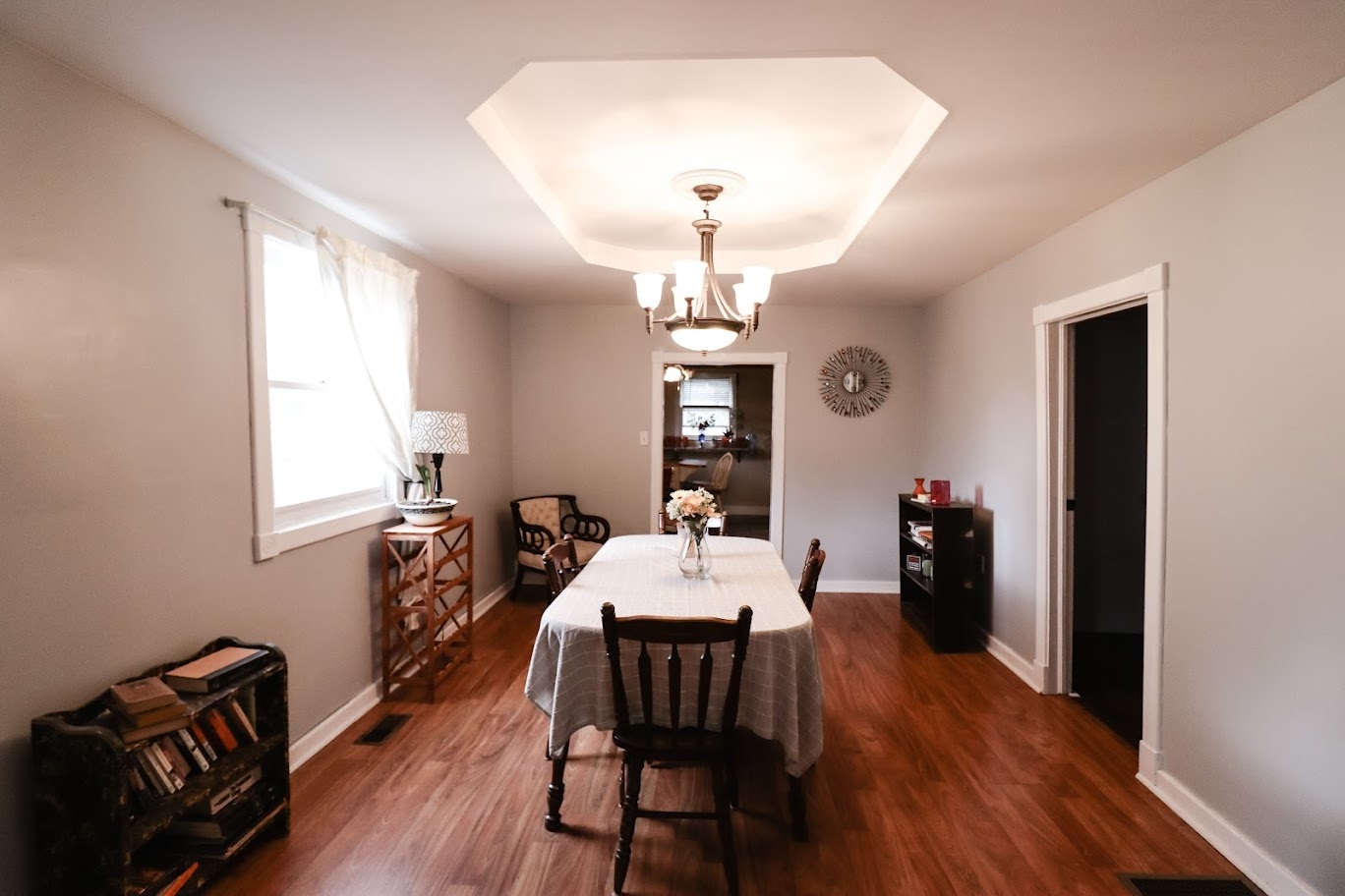 35 Monroe Avenue Charleston, IL 61920 - Photo 9 of 23 a view of a dining room with furniture window and wooden floor