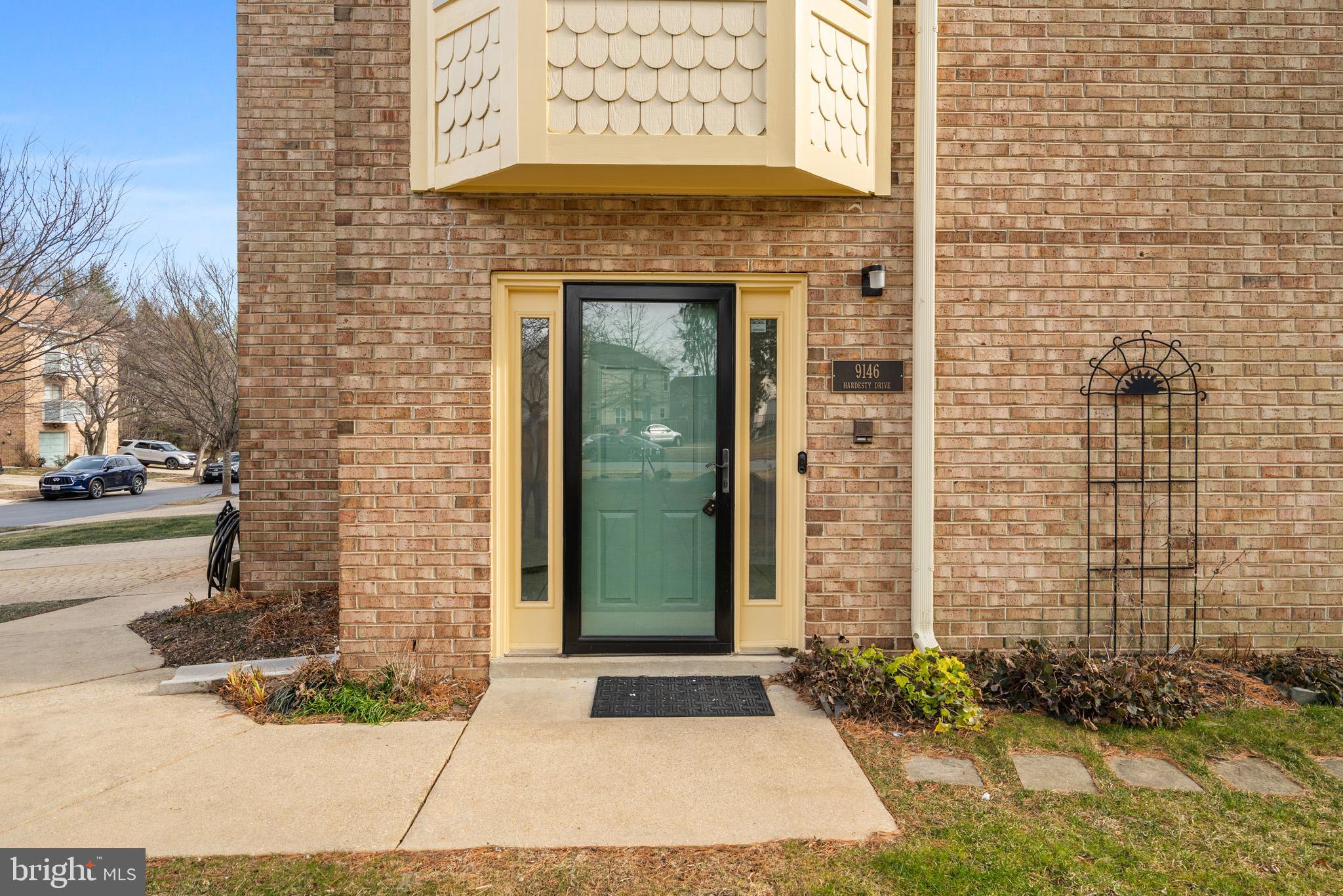 9146 Hardesty Drive Clinton, MD 20735 - Photo 3 of 47 a front view of a building with a garden