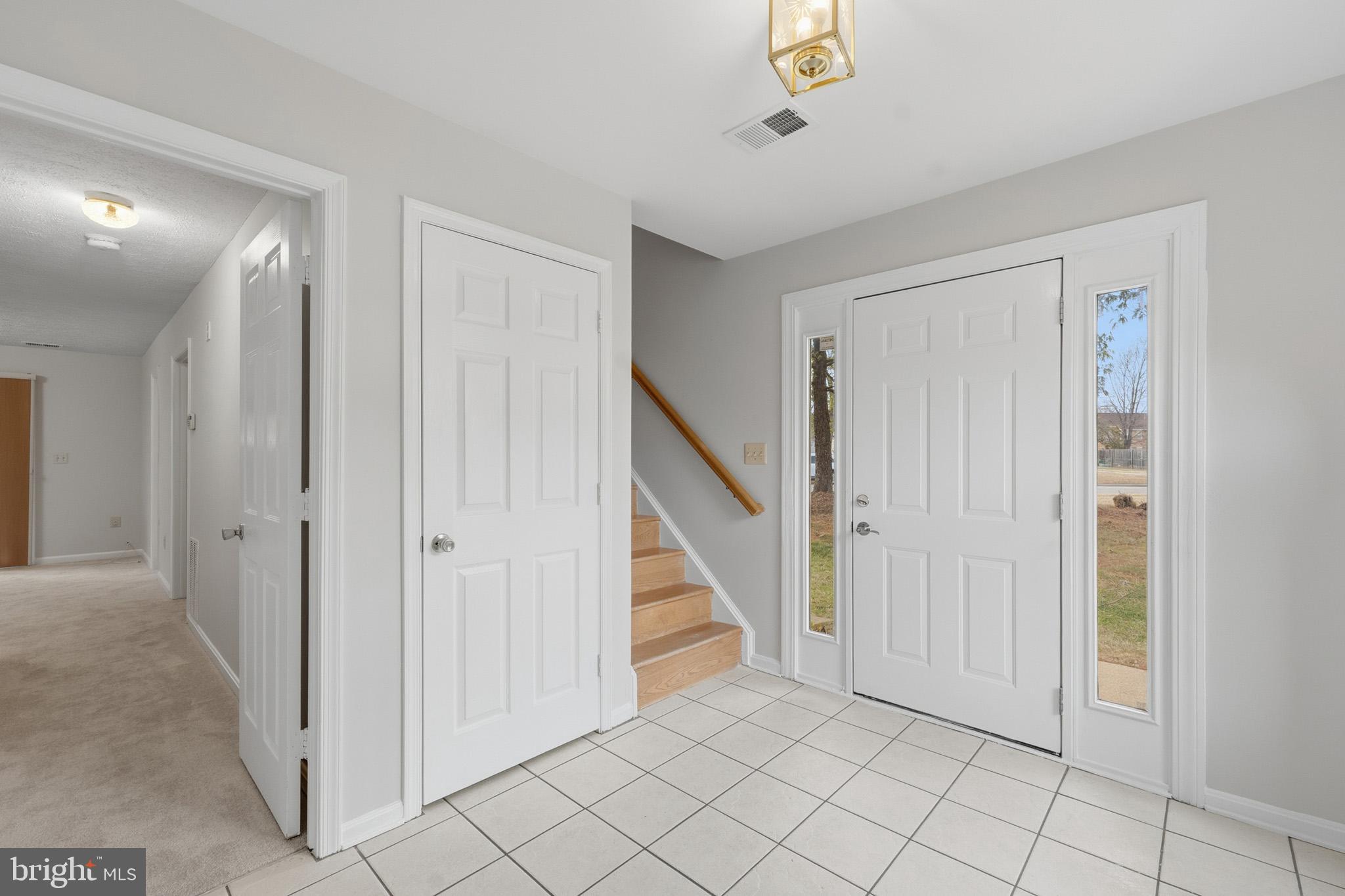 9146 Hardesty Drive Clinton, MD 20735 - Photo 4 of 47 a view of entryway with stairs