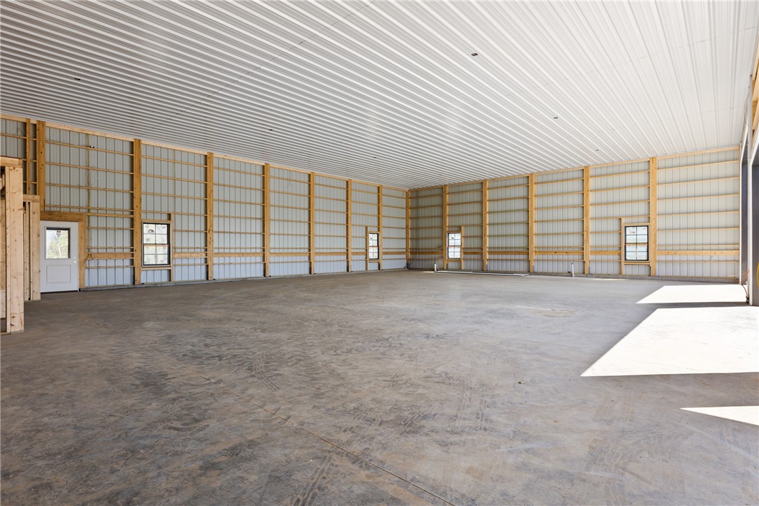 13018 North Country Club Road Effingham, IL 62401 - Photo 9 of 20 65 x 50 Garage Area with three over head doors. 3,250 square feet!
