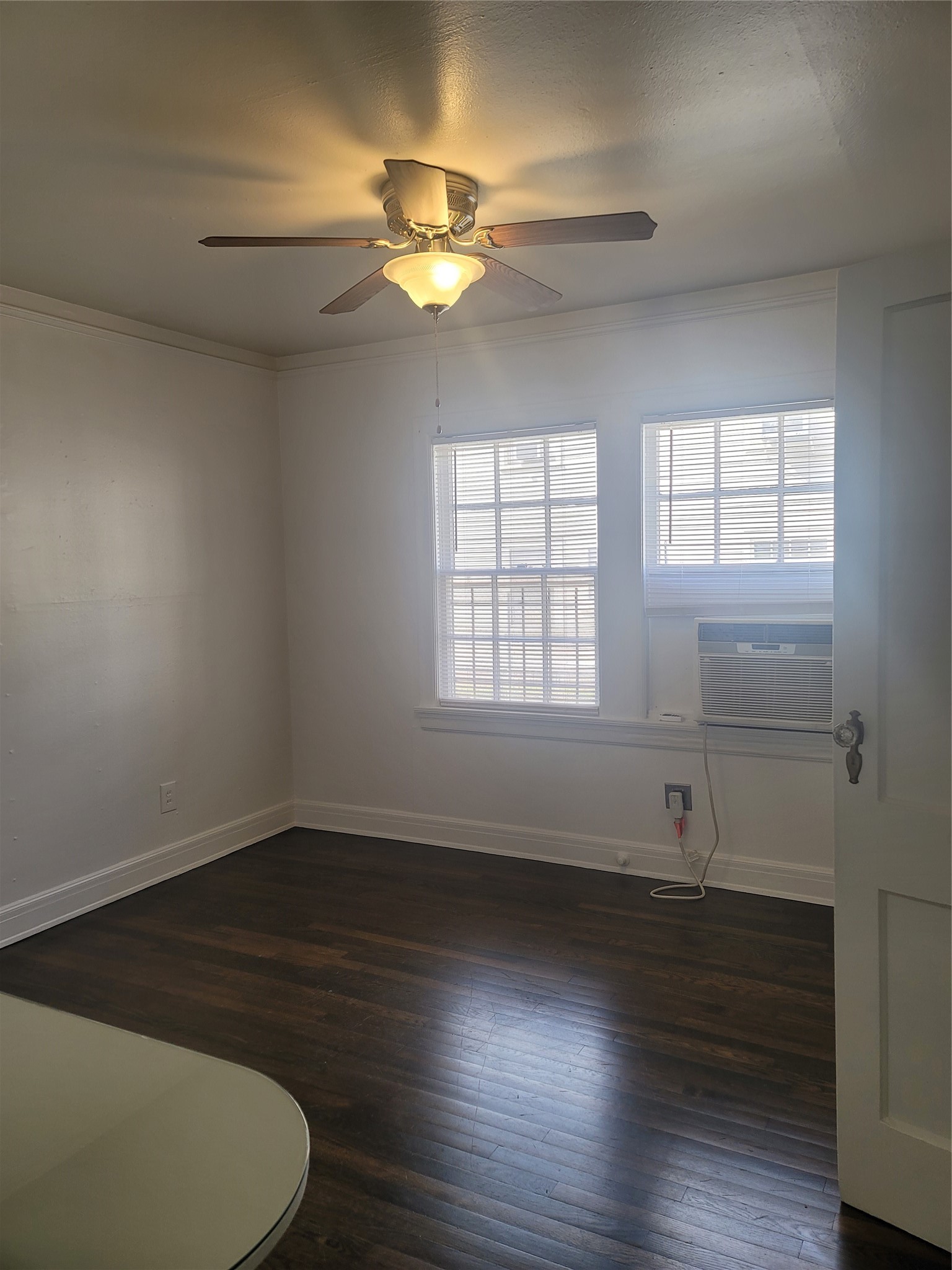 5622 Chartres Street, Unit 3 Houston, TX 77004 - Photo 6 of 14 wooden floor in an empty room with a window