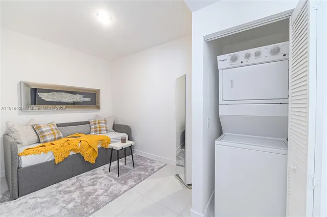 a room with a sink and a mirror