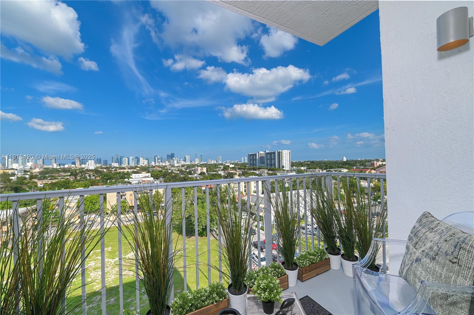 514 Southwest 22nd Avenue, Unit 204 Miami, FL 33135 - Photo 20 of 22 a view of a balcony with lake view and mountain view