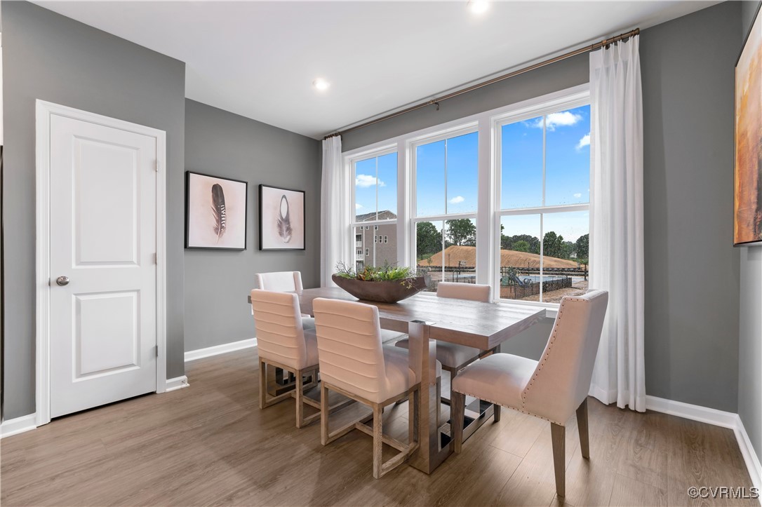 466 Rivanna Hl Road Glen Allen, VA 23060 - Photo 14 of 26 a view of a dining room with furniture window and wooden floor
