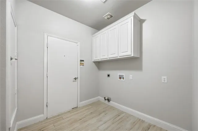 a view of room with hardwood floor