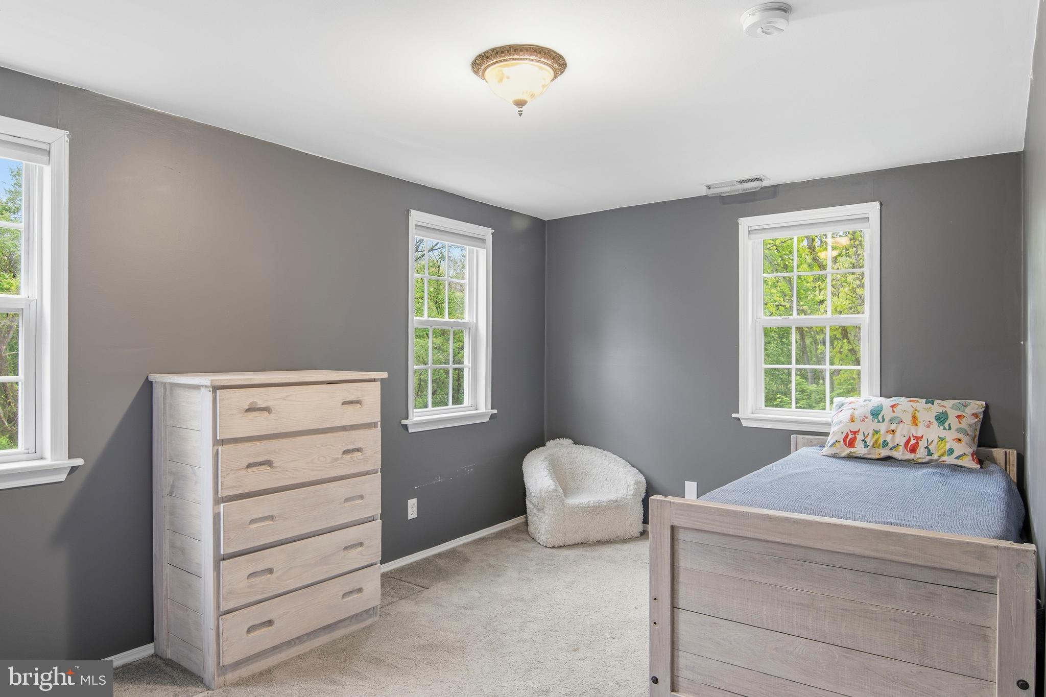 18708 York Road Parkton, MD 21120 - Photo 24 of 59 a bedroom with a bed and a window