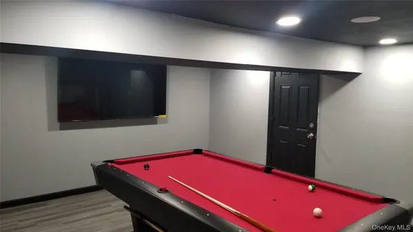 a living room with a flat screen tv