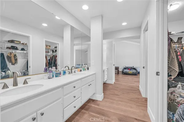 a bathroom with a sink and a shower