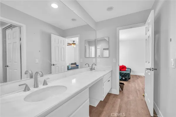 a bath room with a toilet and a bath tub