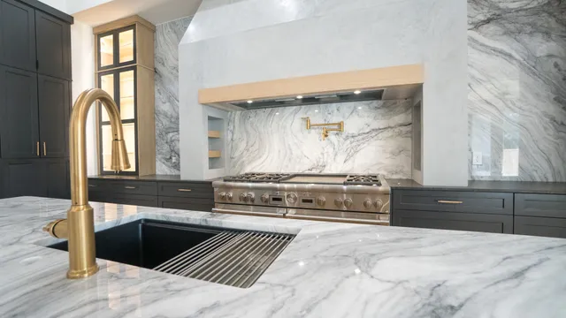 a kitchen with a stove and a sink