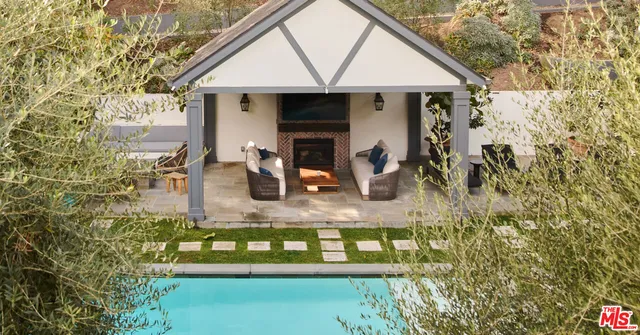 a front view of a house with yard