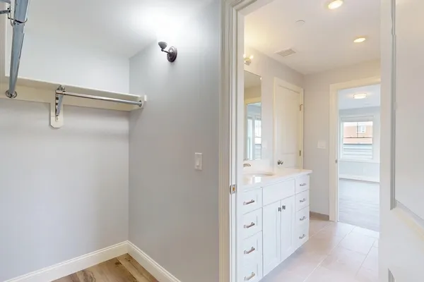 a bathroom with a bathtub and a toilet