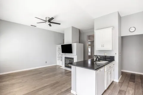 a kitchen with a appliances and cabinets