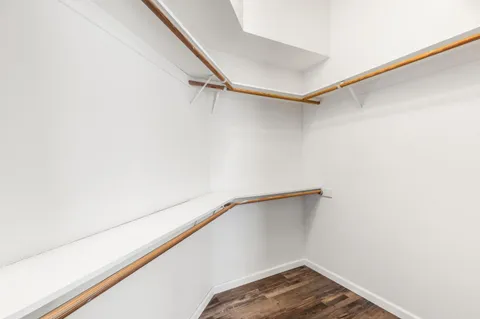 a view of a room with racks on the wall