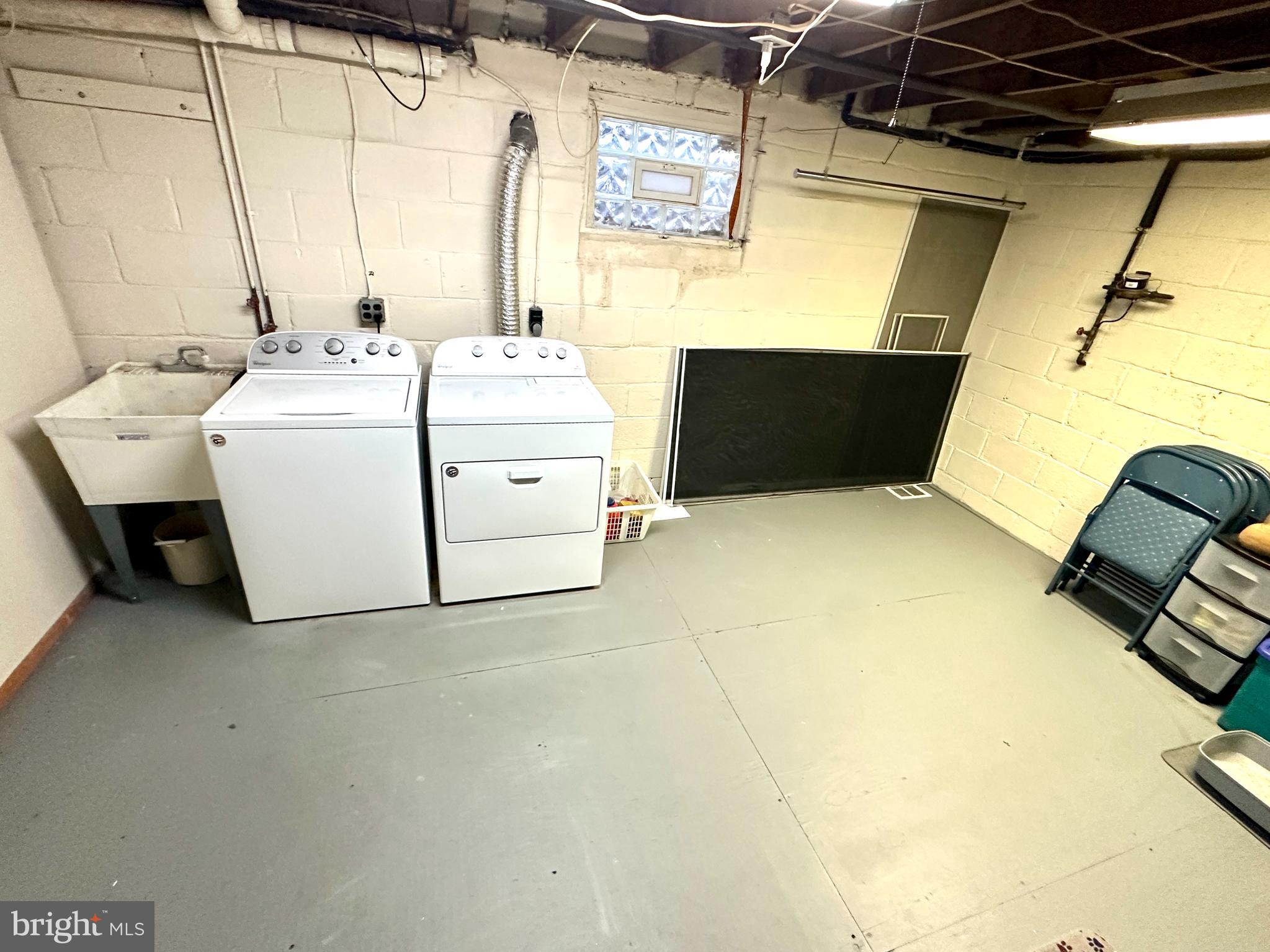 716 Rosa Avenue Croydon, PA 19021 - Photo 47 of 127 a utility room with dryer and washer