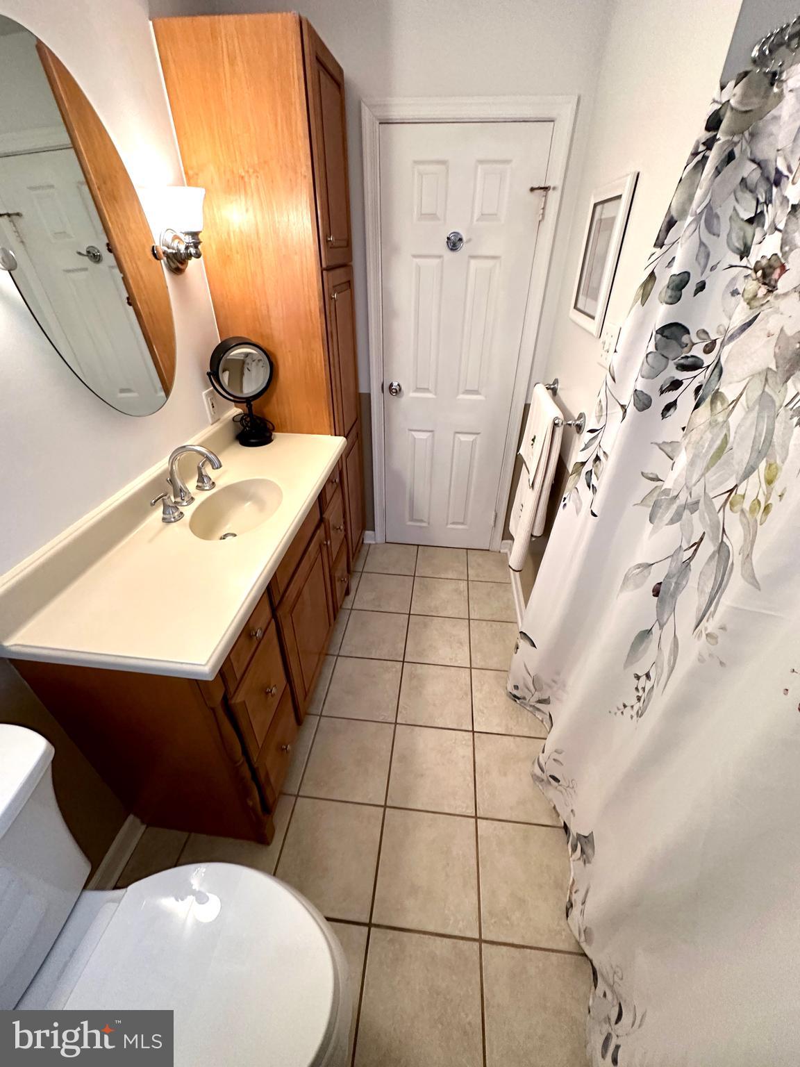 716 Rosa Avenue Croydon, PA 19021 - Photo 73 of 127 a bathroom with a sink toilet and shower