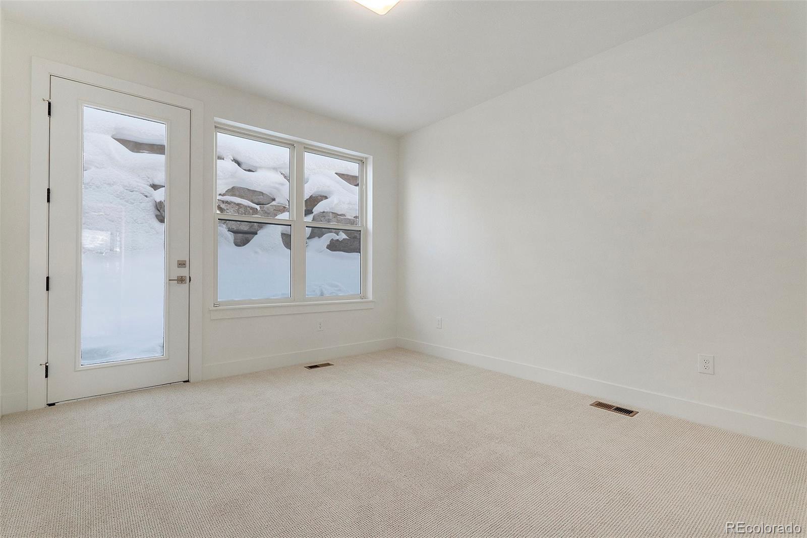 86 High Grove Loop Fraser, CO 80442 - Photo 4 of 20 an empty room with windows