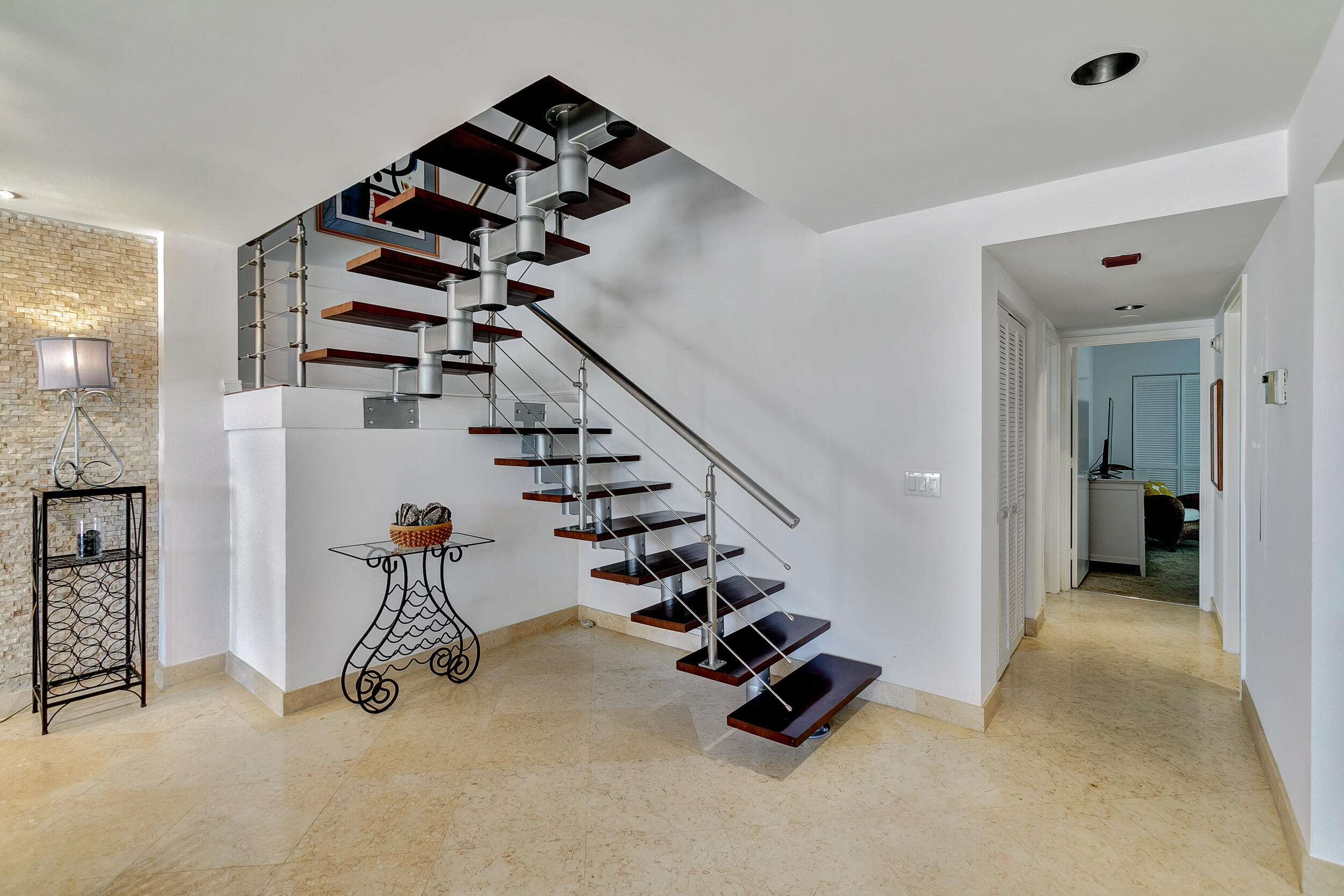 3974 North Ocean Drive, Unit 4 Singer Island, FL 33404 - Photo 12 of 62 Great Room Staircase