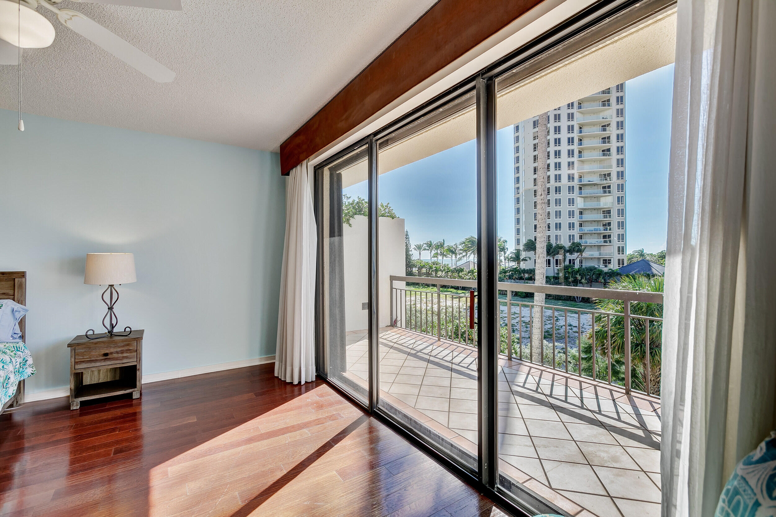3974 North Ocean Drive, Unit 4 Singer Island, FL 33404 - Photo 26 of 62 Master Bedroom Private Patio