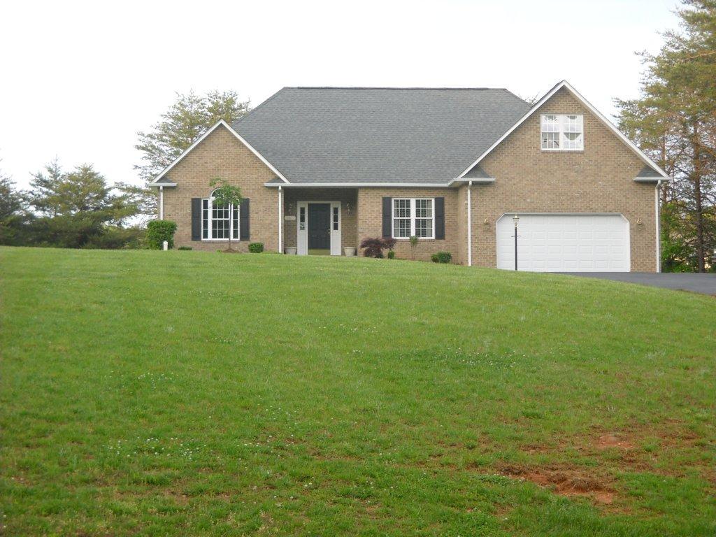 a view of house with outdoor space
