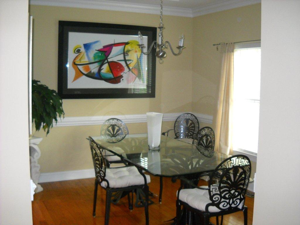 180 Monte Vista Road Union Hall, VA 24176 - Photo 3 of 10 a view of a dining room with furniture and wooden floor