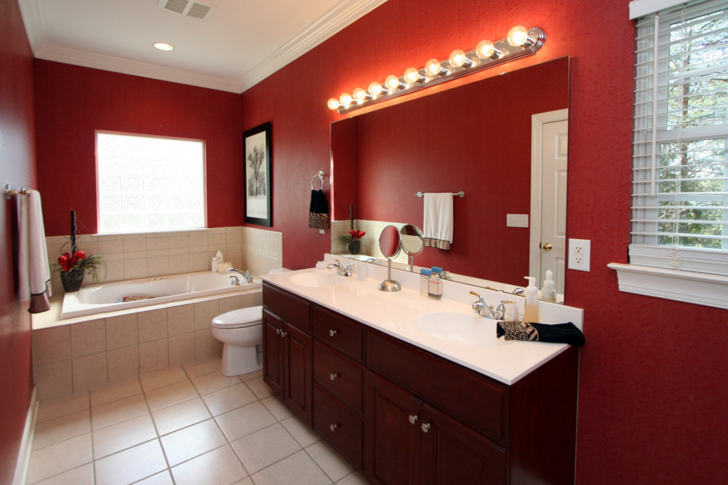 180 Monte Vista Road Union Hall, VA 24176 - Photo 6 of 10 a bathroom with a sink double vanity granite tub and a mirror