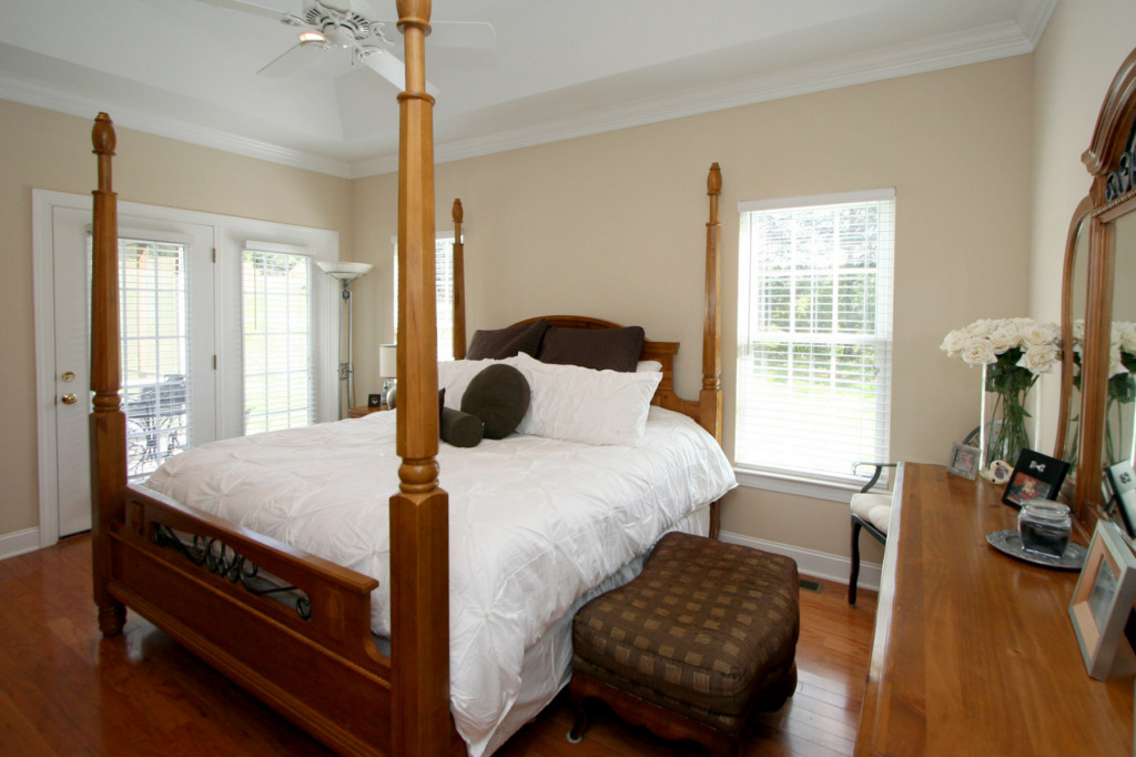 180 Monte Vista Road Union Hall, VA 24176 - Photo 7 of 10 a bedroom with a bed and wooden floor