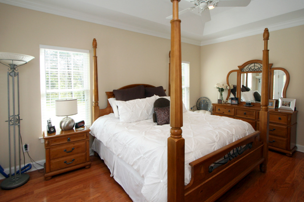 180 Monte Vista Road Union Hall, VA 24176 - Photo 8 of 10 a bedroom with bed and large windows