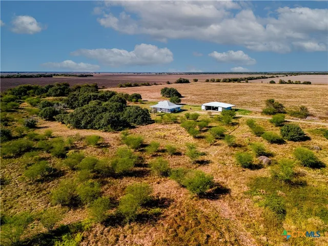a view of a bunch of trees and houses