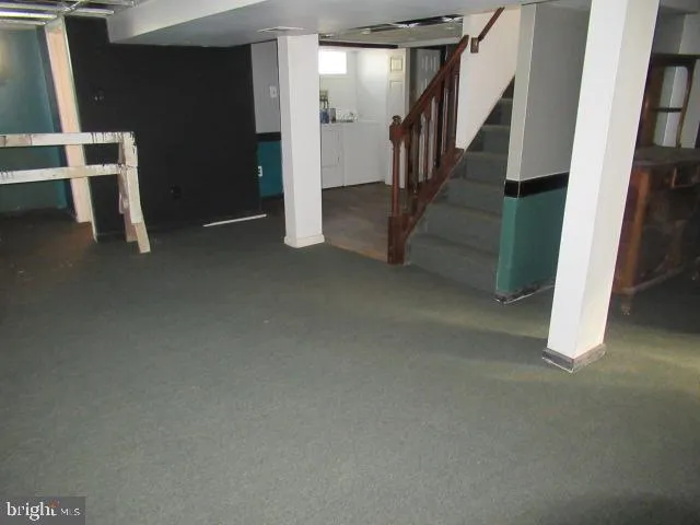 a room with closet and mirror