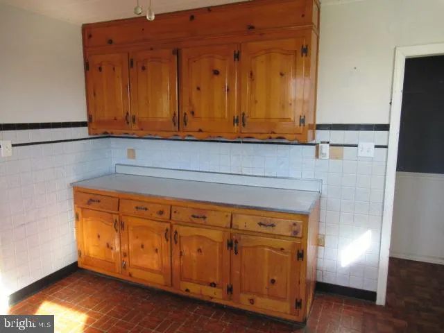 a view of cabinets and wooden floor