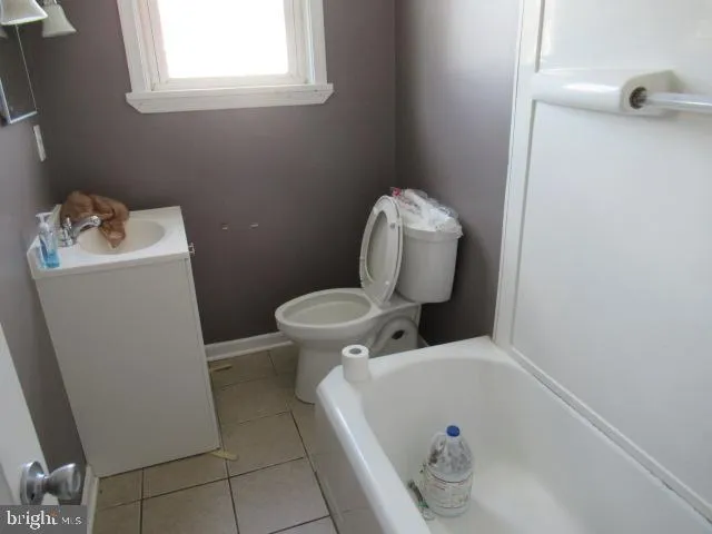 a bathroom with a sink and toilet