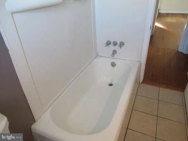 a bathroom with a bathtub