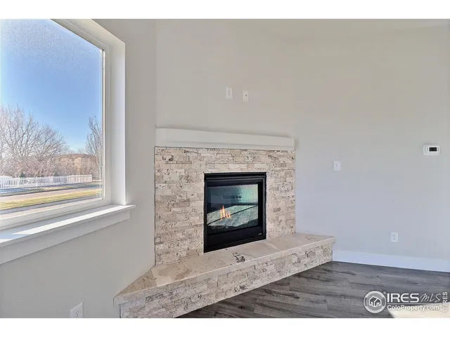 a living room with a fireplace