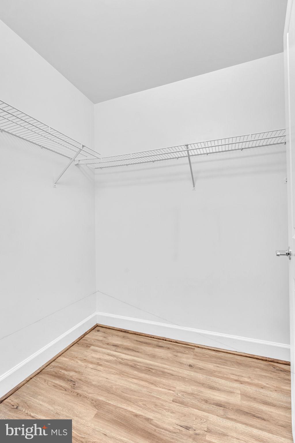 3600 South Glebe Road, Unit 606W Arlington, VA 22202 - Photo 16 of 30 a view of a room with wooden floor