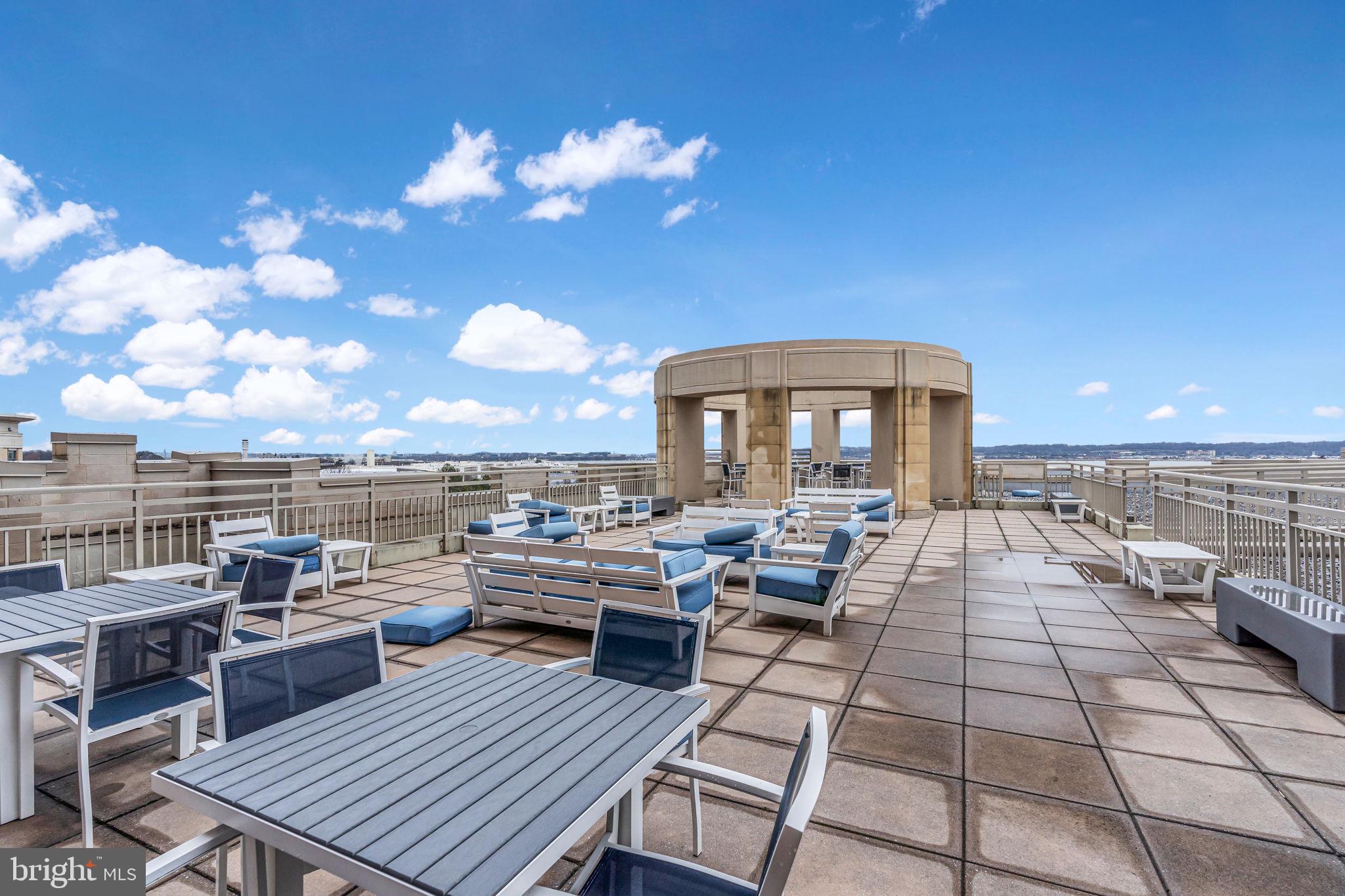 3600 South Glebe Road, Unit 606W Arlington, VA 22202 - Photo 19 of 30 a view of a terrace with seating area and barbeque oven