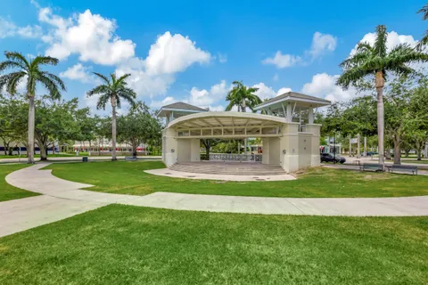 a view of a garden with a fountain