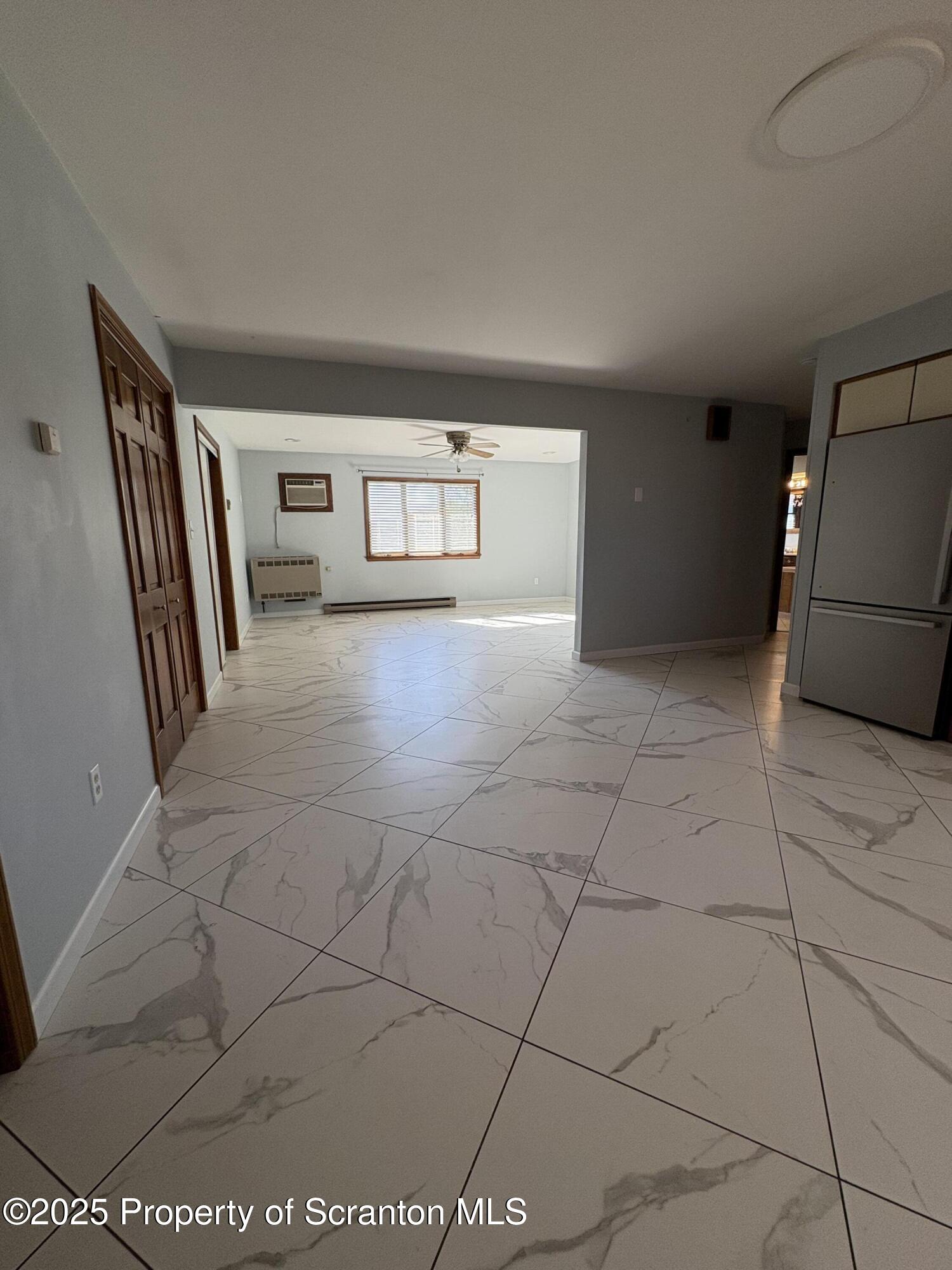 559 Penn Avenue, Unit A Mayfield, PA 18433 - Photo 3 of 9 a view of a livingroom with a furniture