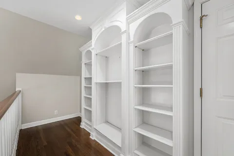 a view of an empty walk in closet