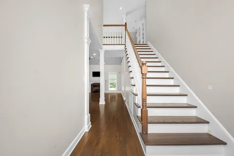 a view of a hallway with staircase