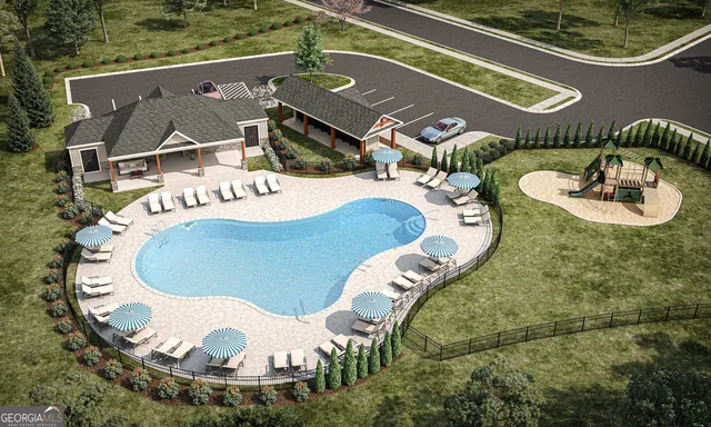 a view of a swimming pool with outdoor seating