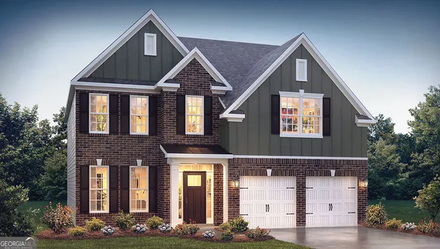 a view of a brick building with a small yard
