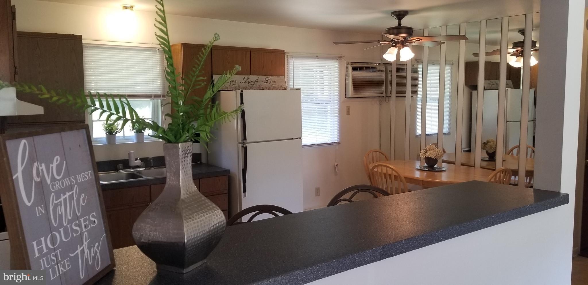5208 South Upper Ferry Road Eden, MD 21822 - Photo 2 of 35 Open living/dining/kitchen areas