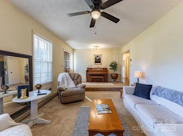 a dining room with furniture a rug and wooden floor