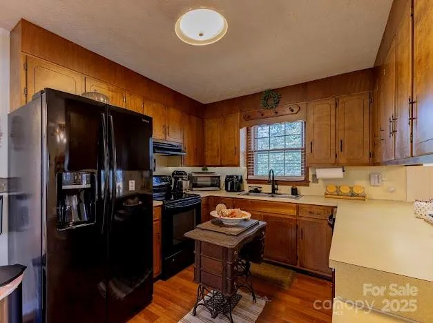 a bathroom with a sink a mirror and a shower
