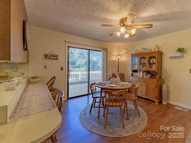 a bedroom with a bed and a television