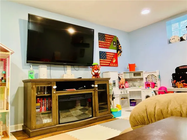 a bedroom with furniture and a bed