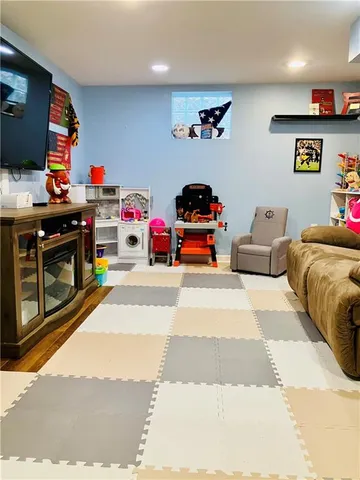 a bedroom with a bed and furniture