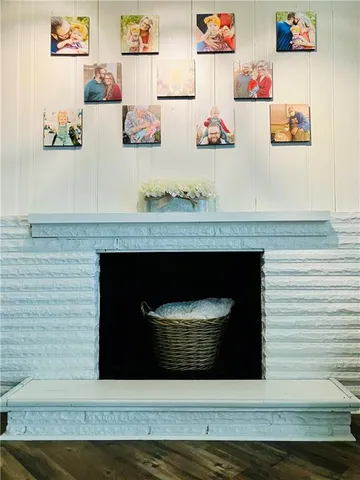 a room with painting and a table